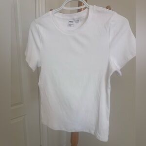 TNA White fitted Ribbed Tee, fits like medium